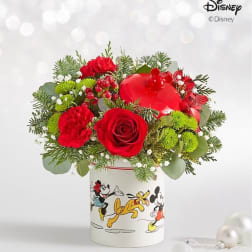 Red flowers arranged in a Disney Mickey and friends vase