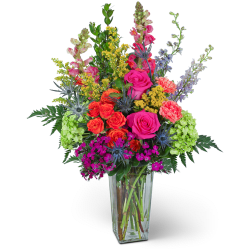 Colorful mixed bouquet in a clear glass vase