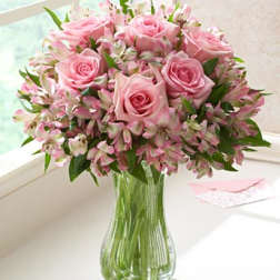 Peruvian lily and pink roses