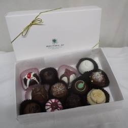 Box of assorted chocolate truffles in paper cups