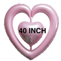 Pink heart-shaped balloons with a smaller heart balloon in front