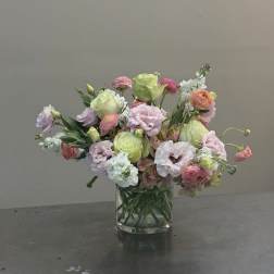 Pastel mixed bouquet in a clear glass vase