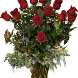 Bouquet of red roses in a clear glass vase