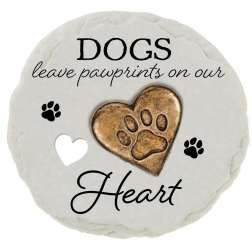 Round memorial stone with paw print heart and the words "Dogs leave pawprints on our Heart"
