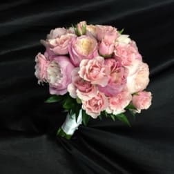 Pink rose bouquet with white accents and wrapped stems
