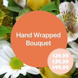 Hand wrapped bouquet with white daisies and spotted alstroemeria