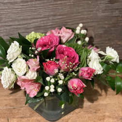 Pink and white mixed bouquet in a glass vase