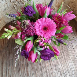 Pink and purple mixed bouquet with tulips and gerbera daisies