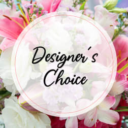 Pink and white mixed flower bouquet with a "Designer’s Choice" label