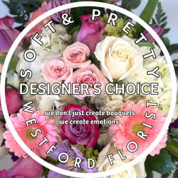 Pastel mixed bouquet of pink and white roses, gerbera daisies, and hydrangeas with designer's choice text overlay.