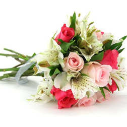 Bouquet of pink roses and white lilies with green foliage