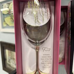 Decorative wine glass in a pink gift box with gold lettering