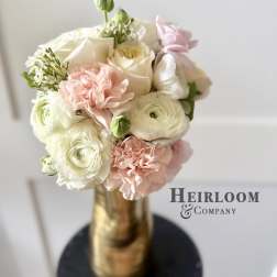Blush and white bouquet in a gold vase