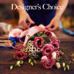 Pink bouquet with ribbon on a table