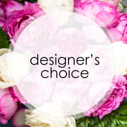 Pink and white flower bouquet with "designer's choice" text overlay