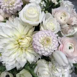 Bouquet of white and pale pink flowers with large blooms
