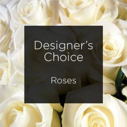 Cream-colored roses with a "Designer’s Choice" label