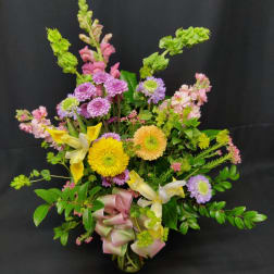 Mixed bouquet with yellow lilies, purple mums, and pink flowers