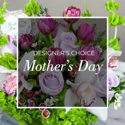 Bouquet of purple tulips, lavender roses, and white orchids