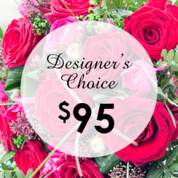 Bouquet of red roses with greenery and a price label