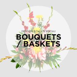 Designer’s choice bouquet with mixed flowers and a pink ribbon