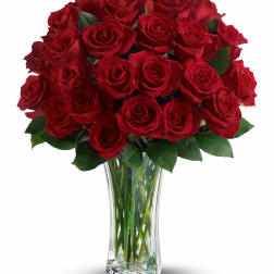 Bouquet of red roses in a clear glass vase