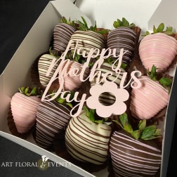 Box of chocolate-covered strawberries with a "Happy Mother's Day" topper