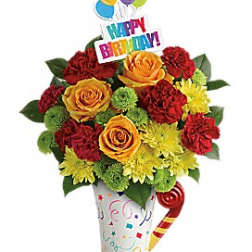 Birthday bouquet with red and yellow flowers in a decorated cone vase