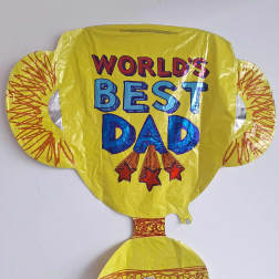 Yellow foil balloon reading "World's Best Dad"