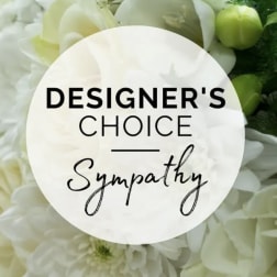 White sympathy floral arrangement with green accents