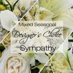 Cream and white sympathy bouquet with roses, lilies, and calla lilies