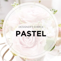 Pastel floral arrangement with pale pink roses and white blooms