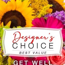Bright mixed bouquet with sunflowers, pink daisies, and purple flowers