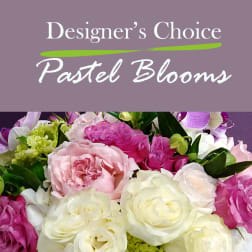 Pastel bouquet of pink, white, and purple roses