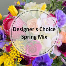Mixed spring bouquet with roses, tulips, and purple blooms