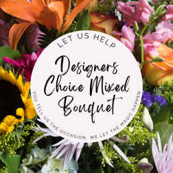 Mixed bouquet with orange lilies, pink blooms, and yellow sunflowers