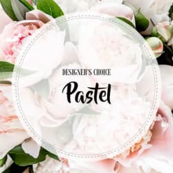 Pastel pink and white flower bouquet with a designer's choice label