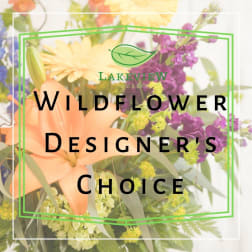 Mixed bouquet with peach and yellow flowers and purple blooms
