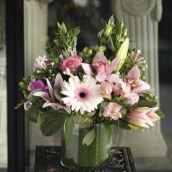 Pink and white mixed bouquet in a glass vase