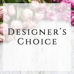 Pink flowers framing a sign that reads Designer's Choice
