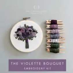 Embroidery kit with a purple bouquet design and thread colors