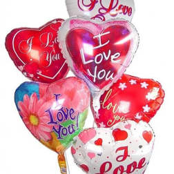 Cluster of heart-shaped Valentine balloons with love messages