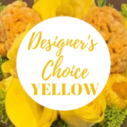 Yellow floral arrangement with a "Designer’s Choice" label