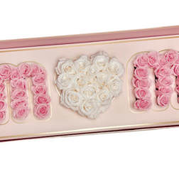 Pink and white roses arranged in a framed heart design with the word MOM.