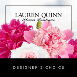Pink and white flowers with a florist logo and designer's choice text