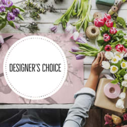 Designer’s choice floral arrangement with tulips and wrapping supplies