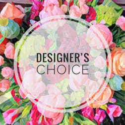Colorful mixed flower bouquet with a "Designer’s Choice" label