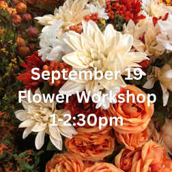 Autumn floral display with cream, orange, and red blooms and workshop text