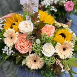 Bouquet with sunflowers, peach and white roses, and cream gerbera daisies