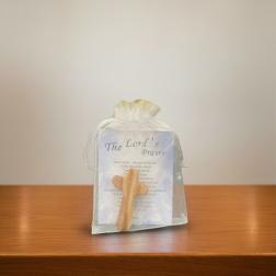 Small gift bag with a wooden cross and prayer card